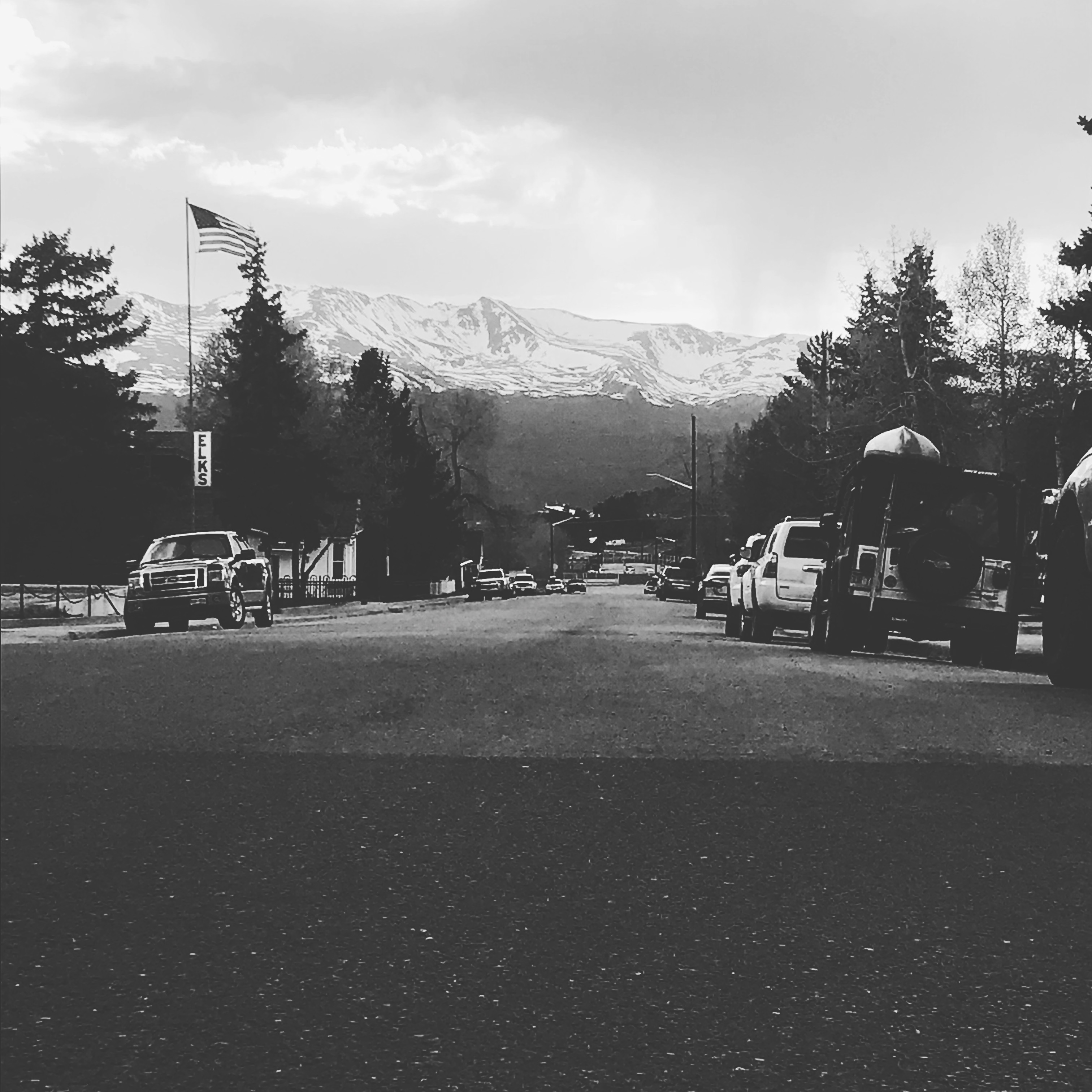 Quiet Ascent — mountain town street